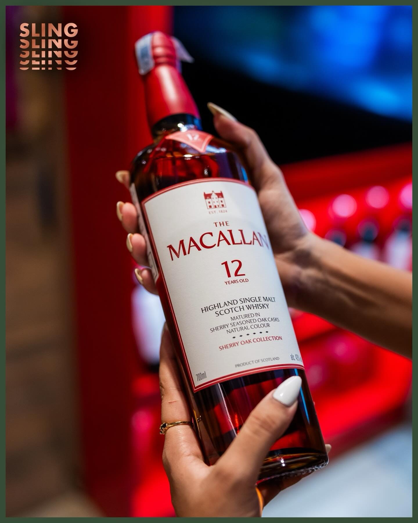 Pouring a bottle of The Macallan 12 at Sling Spirits